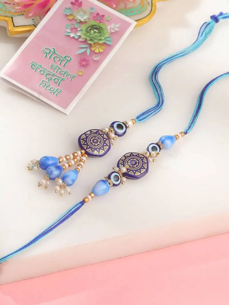 Evil eye set of 2 blue artificial beads bhaiya bhabhi rakhi with roli chawal chandan & mishri