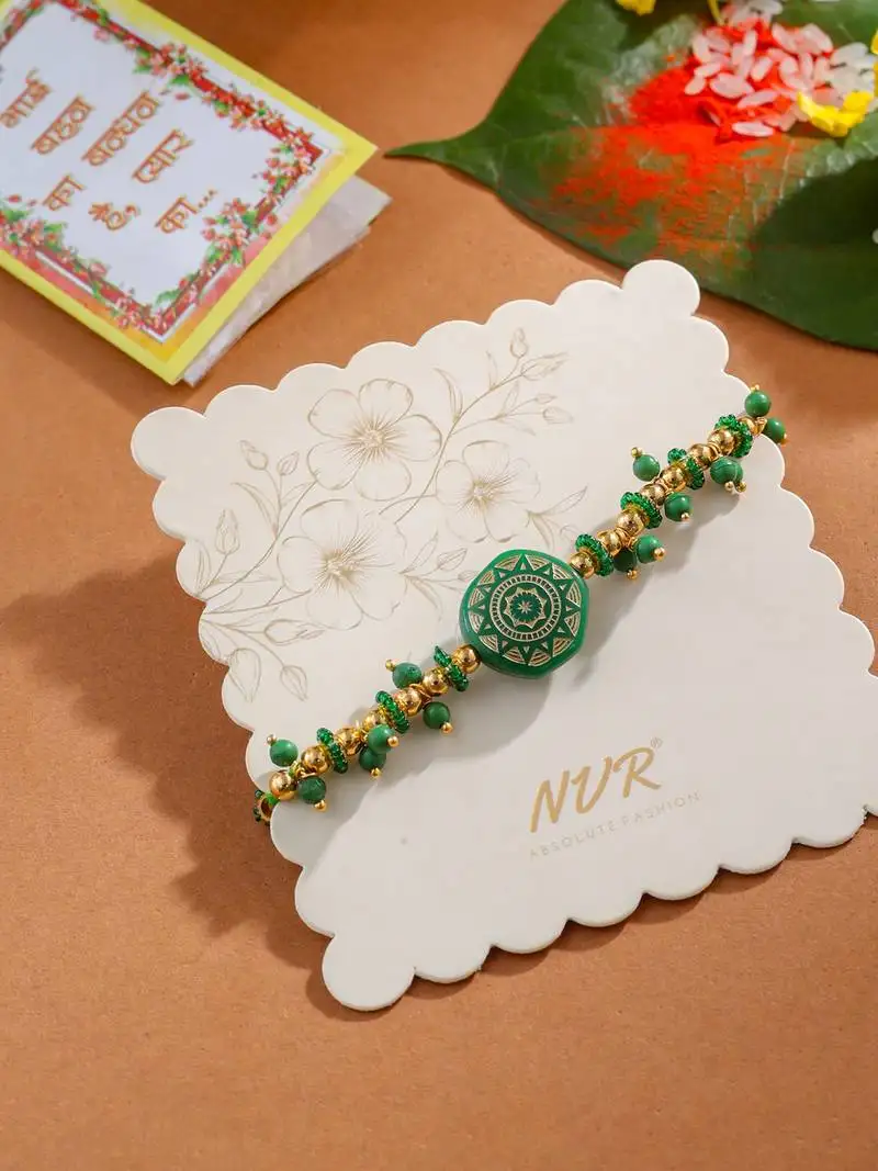 Men green artificial beads round shape thread rakhi with roli chawal chandan & mishri